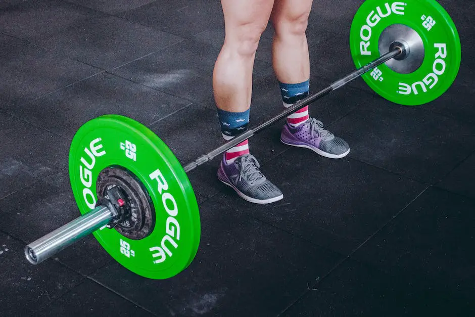 A person selecting weight plates and a barbell for deadlifts