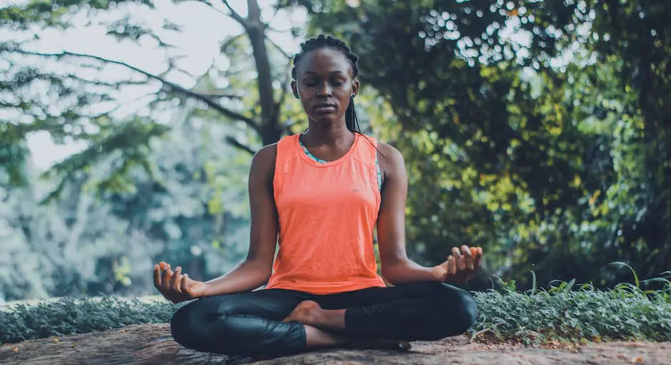 A person practicing stress management techniques for Interstitial Cystitis, such as meditation and deep breathing.