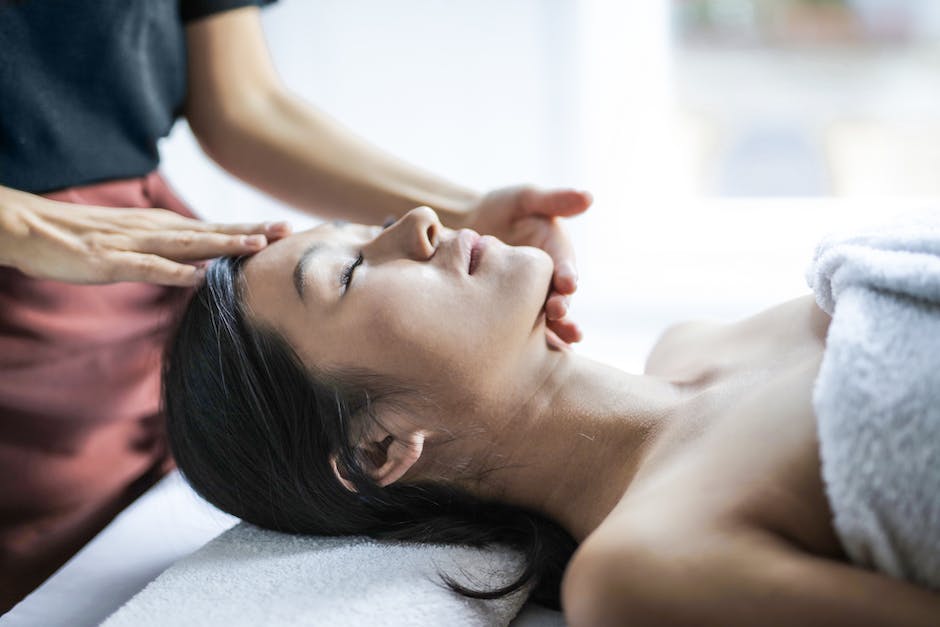 Image depicting a belly massage being performed