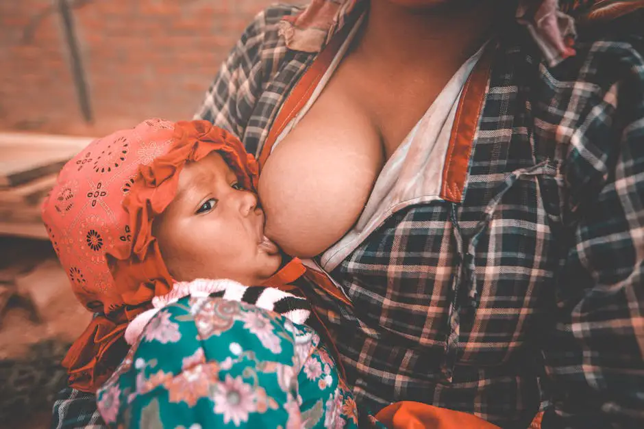 A woman pumping breast milk with a breast pump