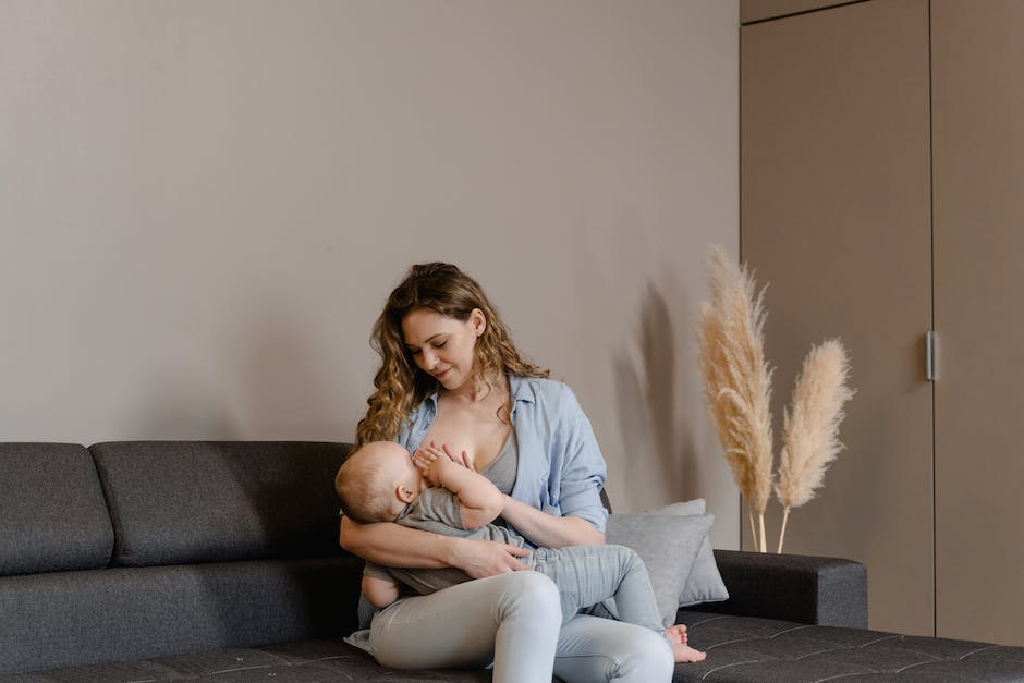 Illustration of a mother breastfeeding her baby