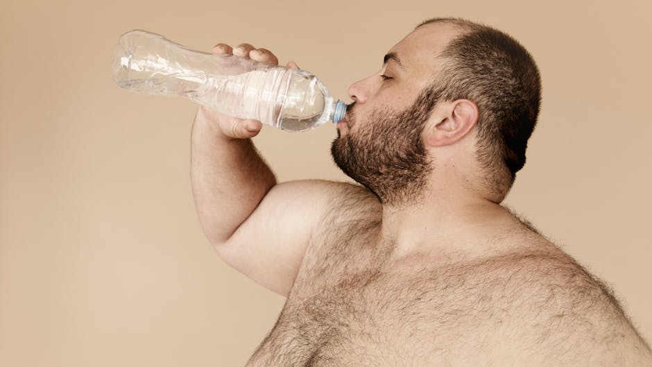 Image depicting a person drinking water from a glass while surrounded by myths and misconceptions related to hydration