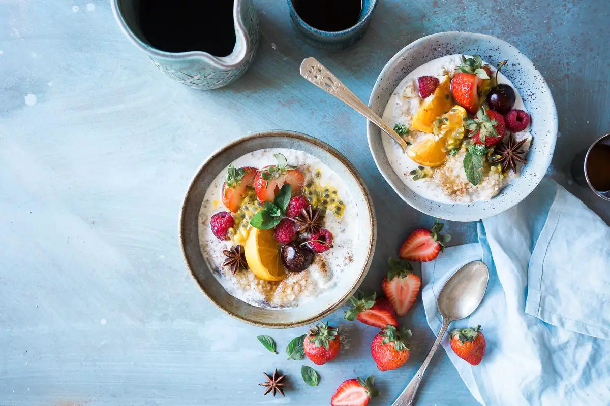 A person meal prepping diabetic-friendly breakfast with various healthy ingredients.