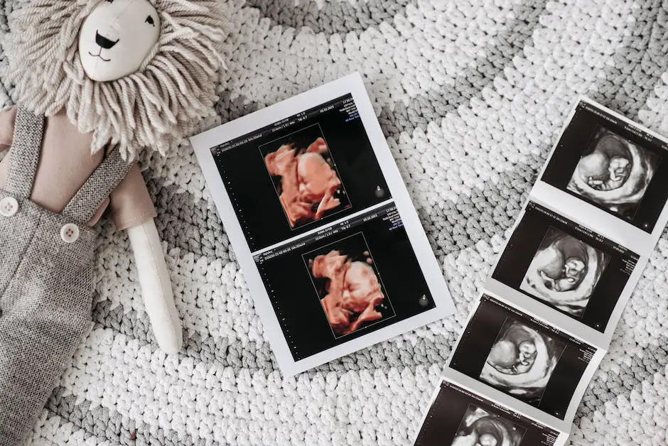 Image of a couple holding hands and looking at an ultrasound together