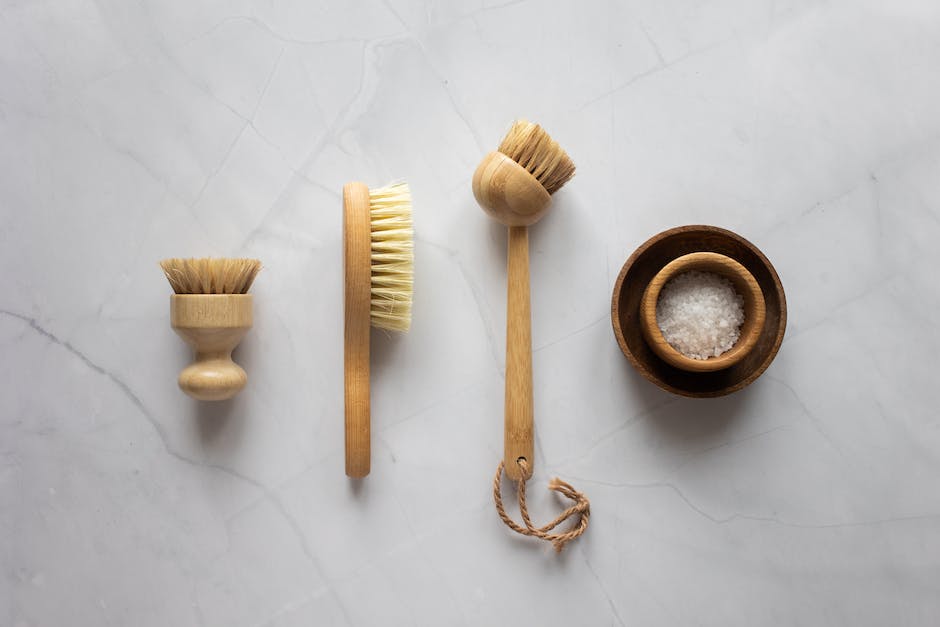 Illustration of different massage tools for belly massage, including hands, massage oils, heated stones, and balls/rollers.