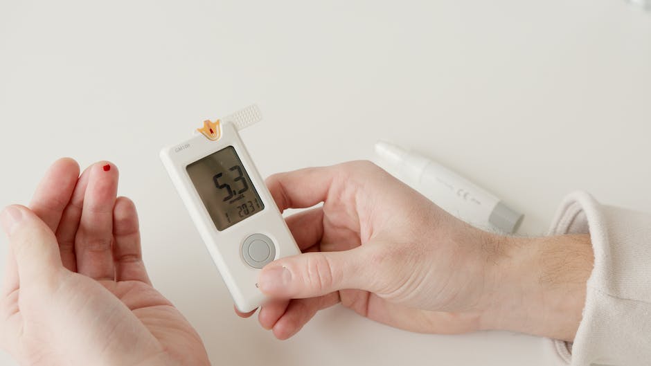 Image depicting the prevention of DKA with various strategies and a person monitoring their blood glucose levels.